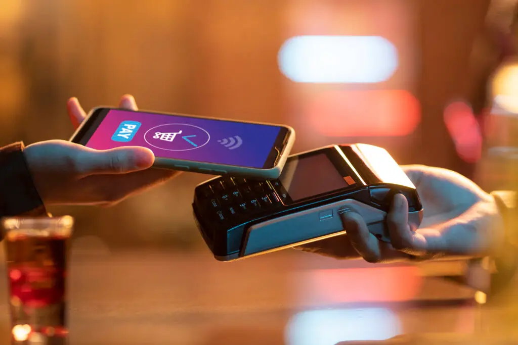 side-view-adult-paying-with-card credit card payment